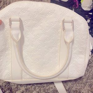 White purse with crossbody strap